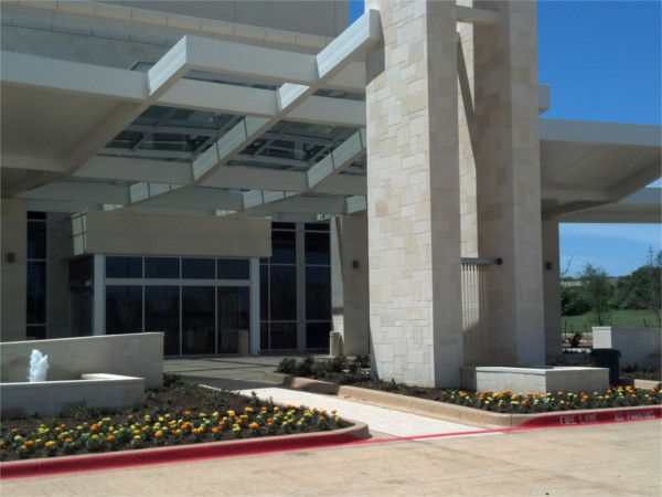 Glass awning skylight at hospital entrance way