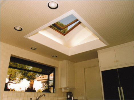 Kithchen interior lit by insulated glass venting skylight