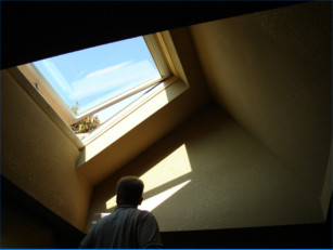 View from inside during sunset of a velux venting insulated glass skylight